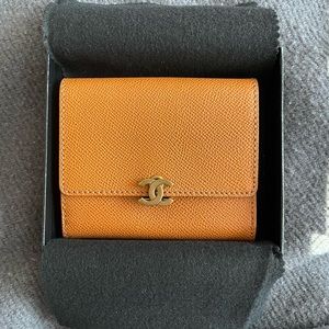 Chanel wallet in original box with card.